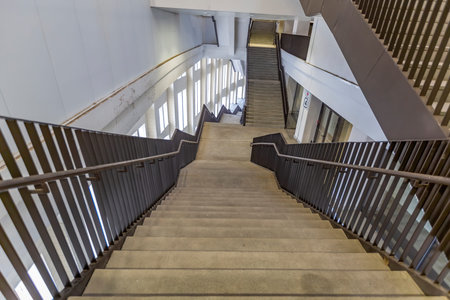 Moscow, Russia - March 14, 2021: Large staircase made of metal and concrete between sectors of the...