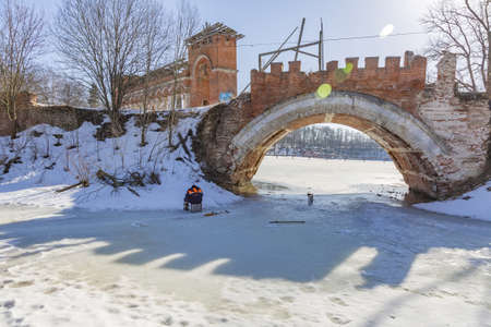 Marfino, Dmitrovsky district, Russia - March 28, 2021: Part of the abandoned facade of the manor. Pseudo-Gothic of the 18th century. Object of the cultural heritage of the peoples of the Russian Federationのeditorial素材