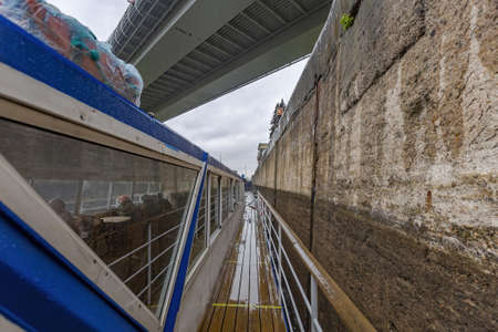 Moscow, Russia - May 8, 2021: Gateway on the Moskva River for adjusting the water level in the riverbed on a cloudy rainy dayのeditorial素材