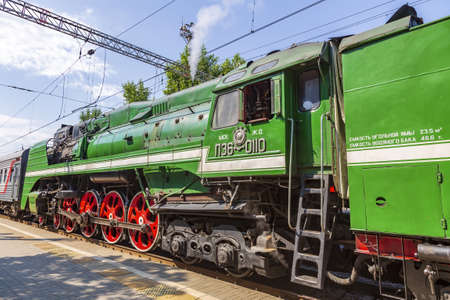 Moscow, Russia - July 11, 2021: Green retro steam locomotive on the railway platform of the Rizhsky stationのeditorial素材