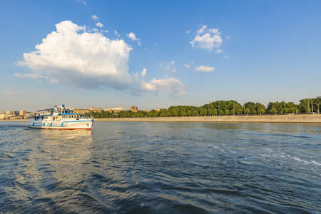 Moscow, Russia - July 13, 2021: Commercial motor ship for tourist excursions along the river in the city limits and environsのeditorial素材