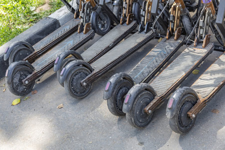 Modern miniature electric scooters for city walks and trips. Pick-up point for rent