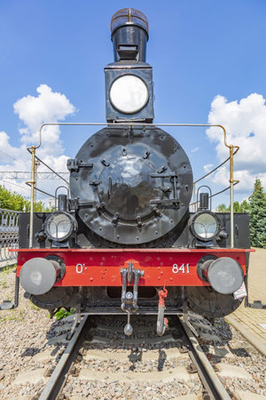 Moscow, Russia - August 14, 2021: Rare black retro steam locomotive. Exposition area of RZD railway vehicles at Rizhskaya stationのeditorial素材