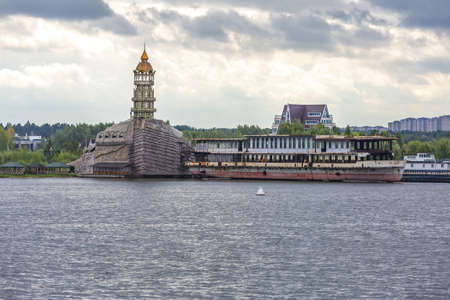 Troitskoye village, Russia - September 10, 2021: The original tower-lighthouse on the shore of the recreation centerのeditorial素材