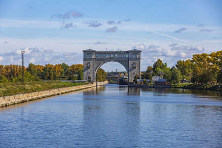 Uglich, Russia - September 11, 2021: Gateway on the Volga river for adjusting the water level in the riverbed on a sunny autumn day. Built in 1941のeditorial素材