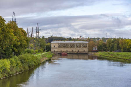 Moscow region, Russia - September 10, 2021: An old gateway on the Moscow Canal for adjusting the water level in the riverbed. A suburb of the capitalのeditorial素材