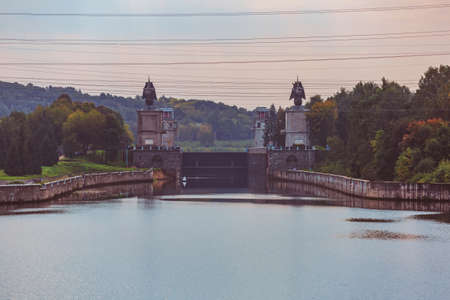 Moscow region, Russia - September 10, 2021: An old gateway on the Moscow Canal for adjusting the water level in the riverbed. A suburb of the capitalのeditorial素材