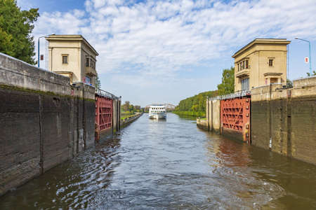 Moscow region, Russia - September 10, 2021: An old gateway on the Moscow Canal for adjusting the water level in the riverbed. A suburb of the capitalのeditorial素材