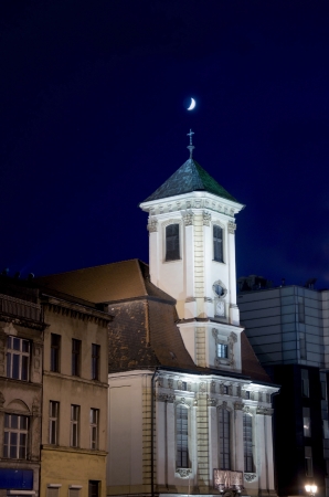 Small Church with moon over the crossの写真素材