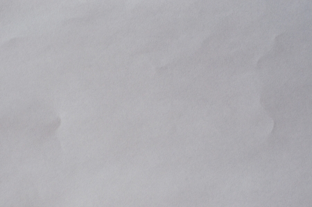 Crinkled sheet of white paperの写真素材