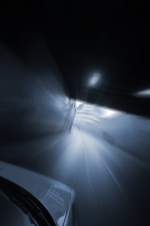 speeding car in tunnelの写真素材