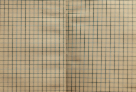 open vintage squared notebook texture or backgroundの写真素材