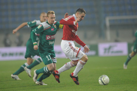 Cracow, POLAND - November 18  Match T-Mobile Ekstraklasa between Wisla Krakow and Slask Wroclaw  Radoslaw Sobolewski and Sebastian Mila in action on  November 18, 2013 in Cracow, Poland のeditorial素材