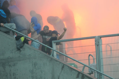 WROCLAW, POLAND - May 06: ultra supporters burn flares during match, Slask Wroclaw vs Lech Poznan on May 06, 2013 in Wroclaw, Poland.のeditorial素材