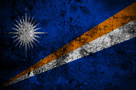 grunge flag of The Marshall Islands with capital in Majuroの写真素材