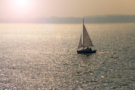 Sailing at sunsetの写真素材