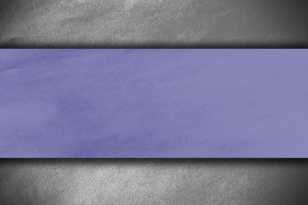blue paper on white wallの写真素材
