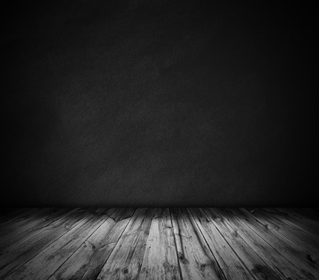Black wall and wooden floor interior backgroundの写真素材