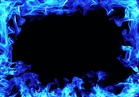 blue fire flames frame on black backgroundの写真素材