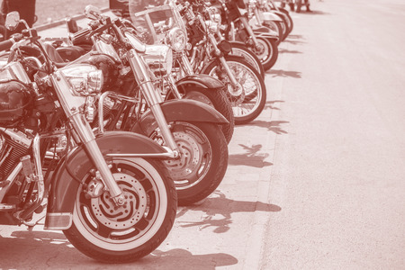 motobikes in a row on sepiaの写真素材