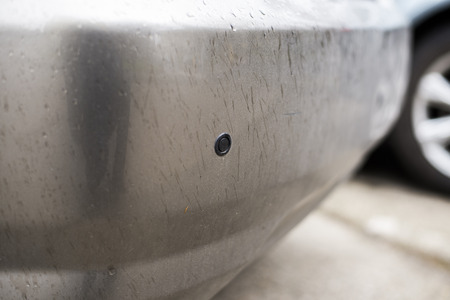 Parking sensors on a car, rainy dayの写真素材