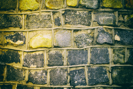 dark grunge Background of stone wall textureの写真素材