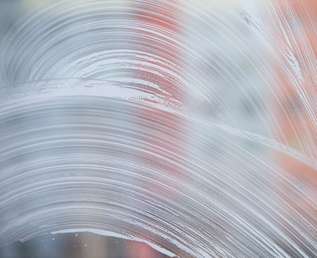 Soap foam stains on the glassの写真素材