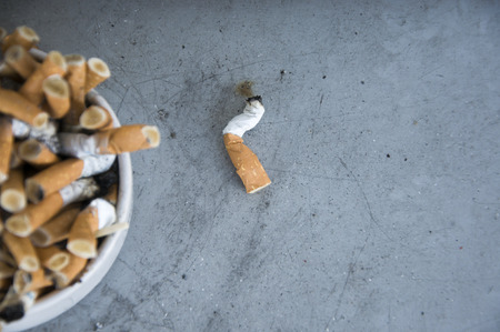 Bad addiction. Ashtray and cigarettes close-upの写真素材