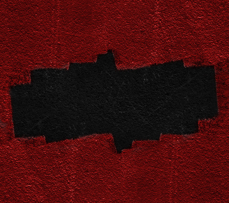 black Hole cracks in the red wall. Broken concrete template for a contentの写真素材