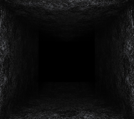dark stone hole. black backgroundの写真素材