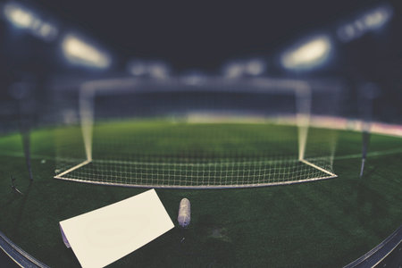 behind the goal with copy space and blurred background