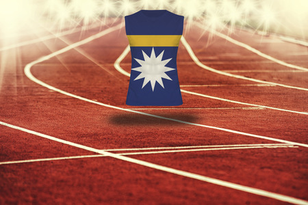 red running track with lines and Nauru flag on shirtの写真素材