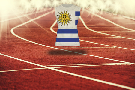 red running track with lines and Uruguay flag on shirtの写真素材