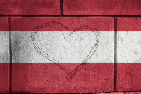 Love heart sing on wall with blending  Austria flagの写真素材