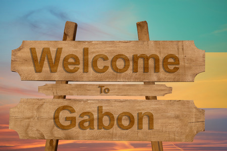 Welcome to Gabon sing on wood background with blending national flagの写真素材