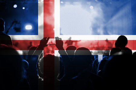 live music concert with blending Iceland flag on fansの写真素材