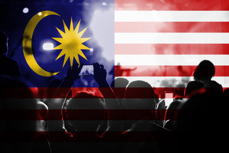 live music concert with blending Malaysia flag on fansの写真素材