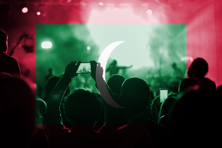 live music concert with blending Maldives flag on fansの写真素材