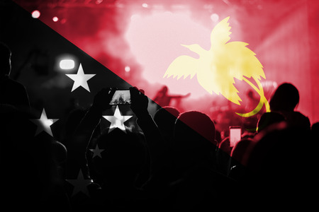 live music concert with blending Papua New Guinea flag on fansの写真素材