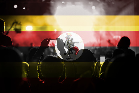 live music concert with blending Uganda flag on fansの写真素材