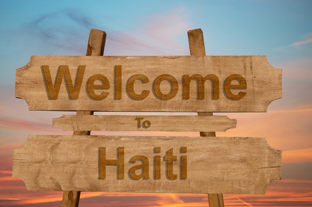 Welcome to Haiti sing on wood backgroundの写真素材