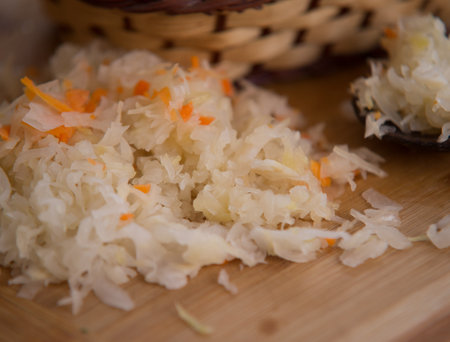 close up on Sauerkraut on wooden plateの写真素材