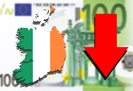 Ireland map on Euro money background and red arrow downの写真素材