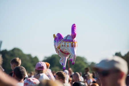 picnin, close up on horse ballon over the blurred peopleの写真素材