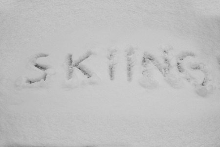 Word skiing written in snowの写真素材
