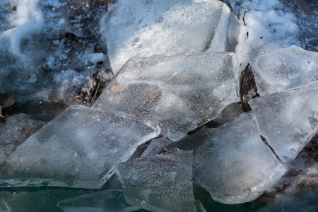 close up on winter broken iceの写真素材