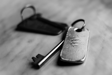 Old vintage metal key, black and whiteの写真素材
