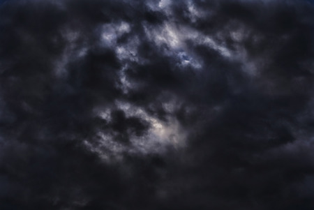 Dark clouds in thunderstorm, good background for manipulationの写真素材