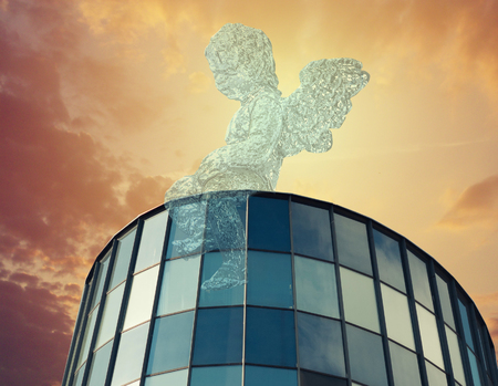 Angel on business against blue skyの写真素材