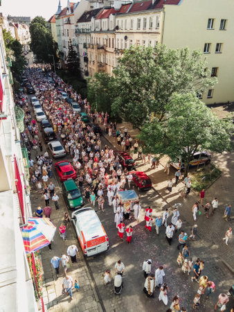 Wroclaw, POLAND - June 15, 2017: Religious procession at Corpus Christi Day in one of the suburban districts of Wroclaw. June 15, 2017. Wroclaw, Poland.のeditorial素材